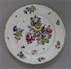 A German Meissen style dish, painted with floral bouquets                                                                              