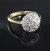 An 18ct gold and diamond cluster ring, size O.                                                                                         