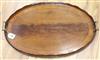 A George III satinwood banded mahogany two handled tea tray width 68cm                                                                 