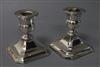A pair of George V silver dwarf candlesticks, Chester 1920, 76mm.                                                                      