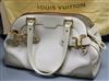 A Louis Vuitton 'Le Radieux' handbag, cream with burgundy trim and matching purse                                                      