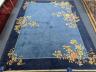 An early 20th century Art Deco Chinese blue ground floral carpet, 400 x 310cm                                                                                                                                               