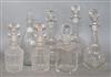 A collection of seven cut glass decanters                                                                                              