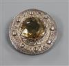 A Scottish celtic design silver and citrine cloak brooch, 38mm.                                                                        