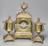 A French brass ornate clock garniture, with French movement, clock height 41cm                                                                                                                                              