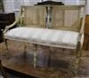 A French style parcel gilt cream painted canape w.101cm                                                                                