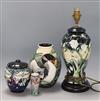 A Moorcroft table lamp, a vase, a lidded bowl and a miniature vase lamp height 32cm                                                    