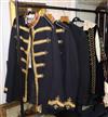 Two gold braided guards uniforms, another and a black velvet theatrical costume                                                        