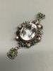 A 19th century Austro-Hungarian white metal, rock crystal, emerald and seed pearl set drop pendant                                                                                                                          