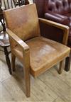 An Art Deco walnut and leather desk chair                                                                                              