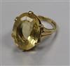 A 9ct gold and oval citrine dress ring, size L.                                                                                        