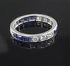 A 1940's/1950's platinum? sapphire and diamond set full eternity ring, size O.                                                         
