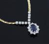 An 18ct two colour gold, sapphire and diamond cluster pendant necklace, 42cm.                                                          