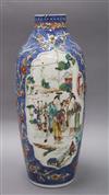 An 18th century Chinese export vase with panels of figures height 29cm                                                                 