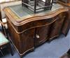 A 19th century Continental mahogany writing desk of serpentine form W.109cm                                                            