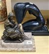 A bronzed metal figure of a young pensive seated lady, and a bronzed figure of a crouching girl                                        