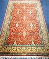 A Persian cream and red ground rug 220 x 132cm                                                                                         