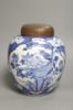 A late 19th / early 20th century Chinese blue and white jar, with wooden cover, height 25cm                                                                                                                                 