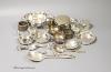 A group of minor silver including a George V trinket box, sauceboat, pair of soup spoons, pair of napkin rings, two bun salts, four small dishes, condiments etc. and three plated items.                                   