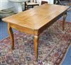 A cherrywood farmhouse table, with drawer W.187cm                                                                                      