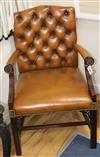 A mahogany framed leather button back 'Gainsborough' armchair                                                                          