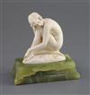 Ferdinand Preiss. An Art Deco carved ivory figure of a crouching female nude, height 5in.                                              