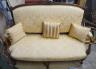A 19th century Continental carved walnut upholstered settee, length 144cm, depth 54cm, height 104cm                                                                                                                         