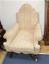 A William and Mary style walnut framed camel back armchair                                                                             