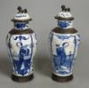 A pair of Chinese blue and white crackle glaze vases and covers, early 20th century, height 22cm                                                                                                                            