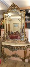 A Louis XV style carved giltwood marble console table, with mirror over W.135cm                                                        