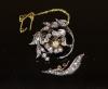 A 19th century gold, silver and rose cut diamond set foliate scroll brooch (a.f.)                                                                                                                                           