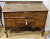 A George I and later feather banded walnut lowboy W.98cm                                                                               