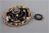 Two Victorian mourning brooches, the larger set with hardstone and split pearls.                                                       