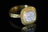 A modern 18ct gold and pave set diamond square cluster ring                                                                                                                                                                 