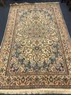 A Persian cream ground rug 270 x 165cm                                                                                                 