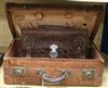 An early 20th century crocodile skin briefcase and a suitcase suitcase length 49cm                                                     