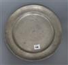 A pewter plate                                                                                                                         