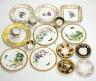 A small collection of Victorian porcelain tea cups and saucers and sundry dessert plates                                                                                                                                    