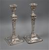 A pair of late Victorian silver Adam style candlesticks by Martin, Hall & Co, London, 1892/4 (one later associated sconce), 29.2cm.    