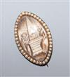 A Regency yellow metal, ivory and split pearl elliptical mourning brooch, 30mm.                                                        