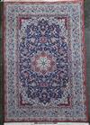 A fine Tabriz blue ground rug, 7ft 10in by 4ft 10in.                                                                                   