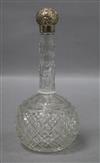 An early 20th century silver topped long necked cut glass globular scent bottle, Miller Bros. Birmingham, circe 1905,                  