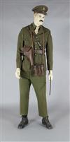 A WWI Royal Field Artillery officer's dress uniform and accessories, on a mannequin,                                                   