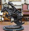 After Frederick Remington. A bronze group, "Cheyenne", on black marble plinth height 80cm                                              