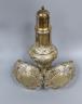 An Edwardian silver sugar caster, 23.8cm and a pair of pierced silver bonbon dishes, 11.5oz.                                                                                                                                