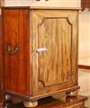 A Victorian mahogany cupboard, enclosed by a panelled door W.50cm                                                                      