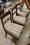 A set of four Regency style mahogany dining chairs                                                                                     