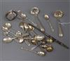 A group of small silver flatware including a Georgian toddy/cream ladle and a white metal toddy ladle with baleen handle.              