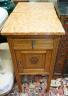 A pair of early 20th century marble topped carved oak bedside cabinets, width 42cm, depth 38cm, height 82cm                                                                                                                 