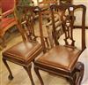 A pair of Chippendale style mahogany dining chairs                                                                                     